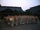Gathering up hats and drums before going inside for morning service